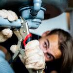 Man fixing kitchen sink